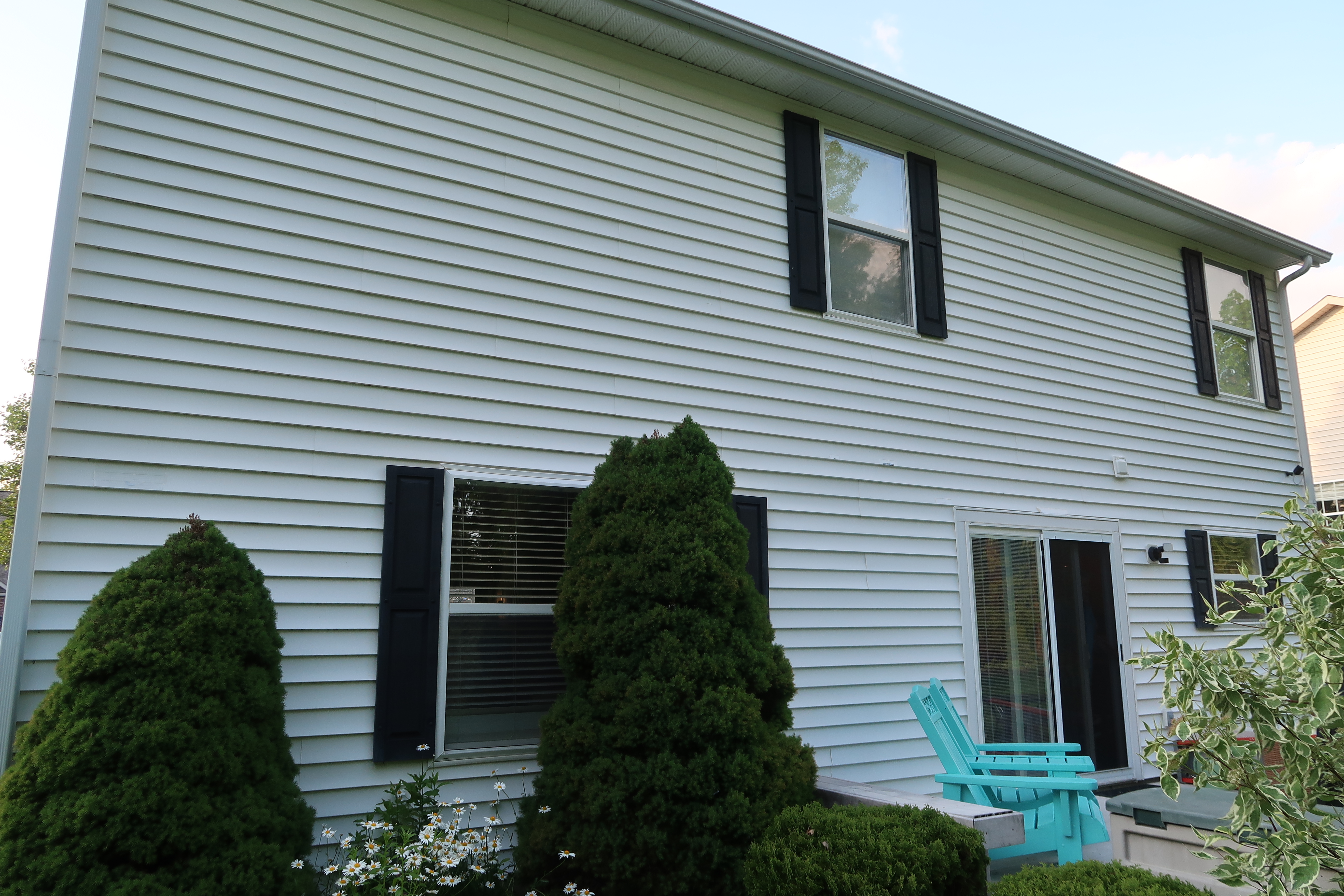 Clean house siding after soft washing