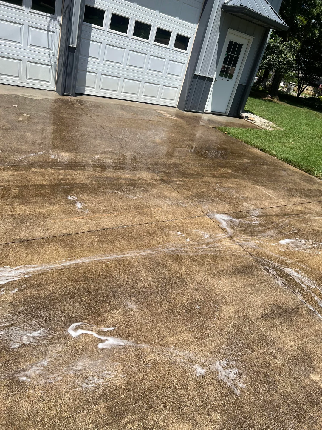 Driveway mid-clean during surface cleaning